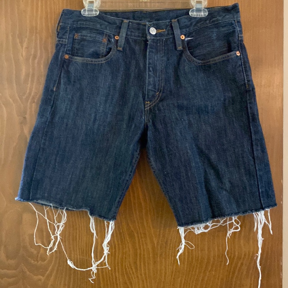 Levi’s bermuda length 33” waist shorts.